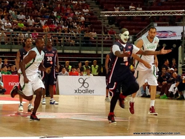 Dennis Rodman chasing the ball.