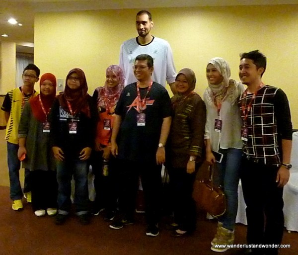 Regular size people and Jaber Rouzbahani.